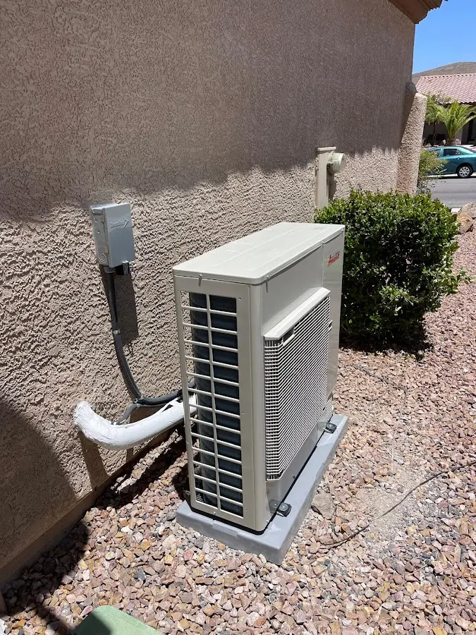 Residential air conditioning condenser unit in Phelan